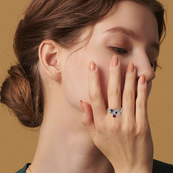 Adjustable Ring with Black Paw Prints & Red Gemstone